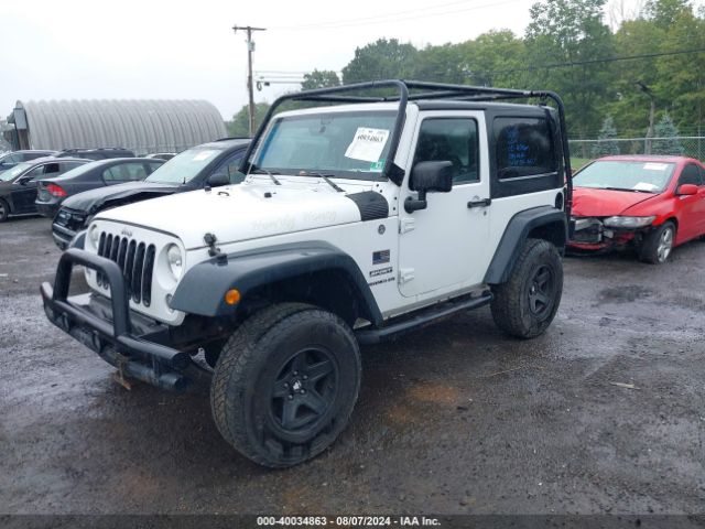 1C4GJWAG4EL249935 Jeep Wrangler Sport