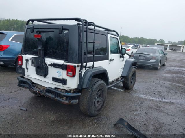 1C4GJWAG4EL249935 Jeep Wrangler Sport