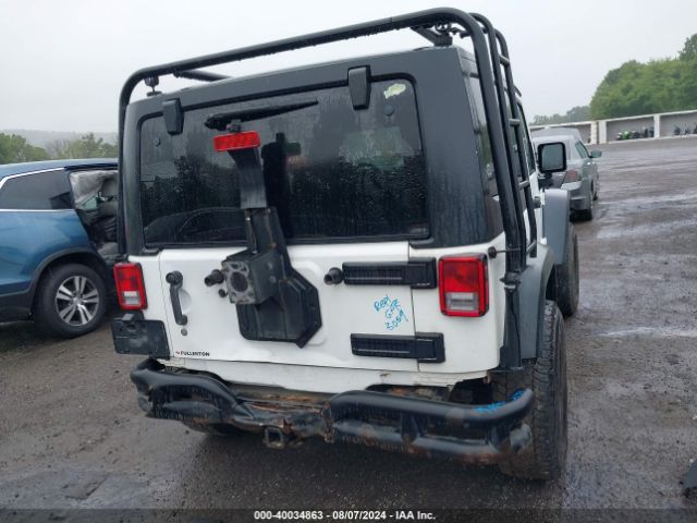 1C4GJWAG4EL249935 Jeep Wrangler Sport