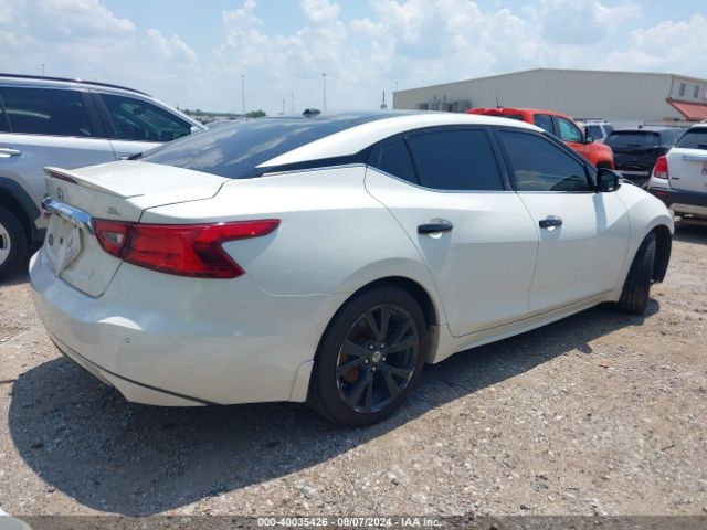 1N4AA6AP9GC903424 Nissan Maxima 3.5 Sl