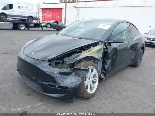 2024 TESLA MODEL Y 7SAYGAEE6RF984426 Photo 1