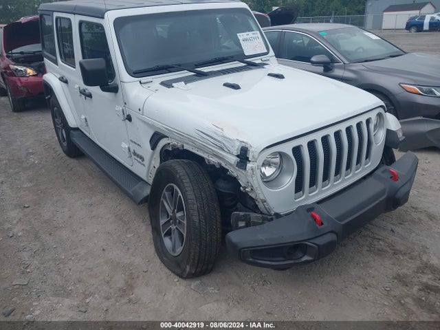 1C4HJXEG0JW132365 Jeep Wrangler Unlimited Sahara 4x4