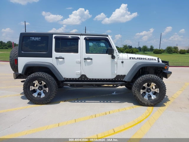 2011 Jeep Wrangler Unlimited Rubicon მანქანა იყიდება აუქციონზე, vin: 1J4BA6H10BL536027, აუქციონის ნომერი: 40043584