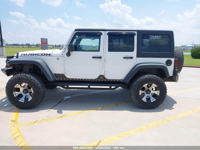 2011 Jeep Wrangler Unlimited Rubicon მანქანა იყიდება აუქციონზე, vin: 1J4BA6H10BL536027, აუქციონის ნომერი: 40043584