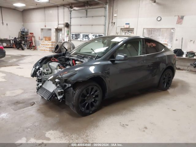 2024 TESLA MODEL Y 7SAYGDEE6RA276840 Photo 1