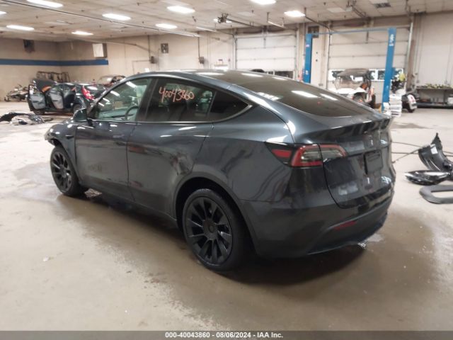 2024 TESLA MODEL Y 7SAYGDEE6RA276840 Photo 2