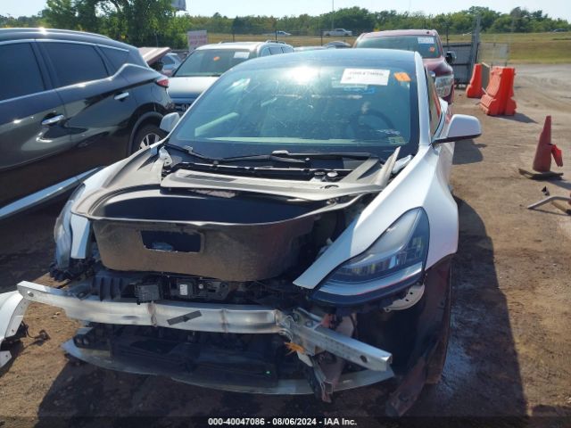 5YJ3E1EA5MF851319 Tesla Model 3 Standard Range Plus Rear-wheel Drive