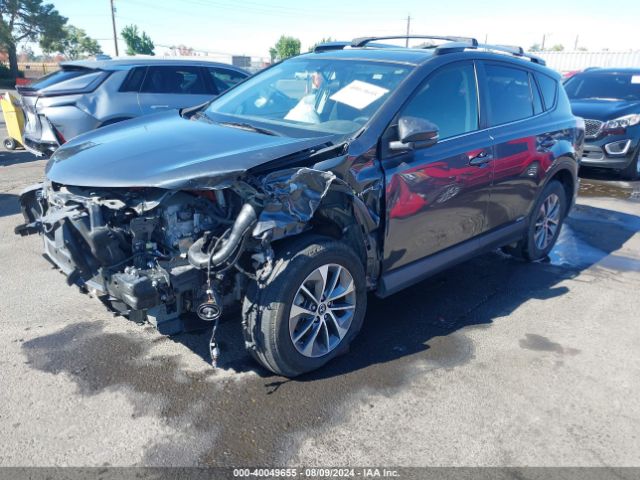 JTMRJREV1GD000685 Toyota Rav4 Hybrid Xle