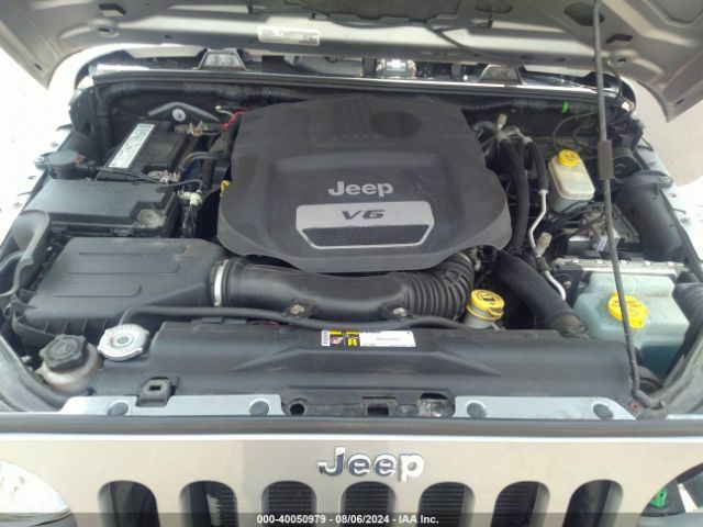 1C4BJWDG8GL158448 Jeep Wrangler Unlimited Sport