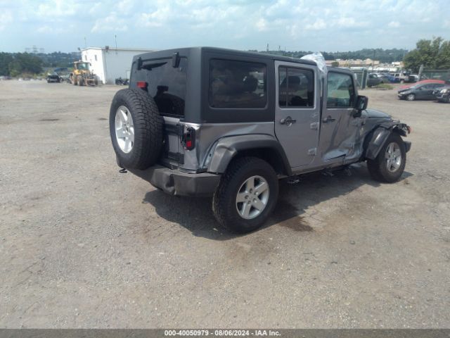 1C4BJWDG8GL158448 Jeep Wrangler Unlimited Sport