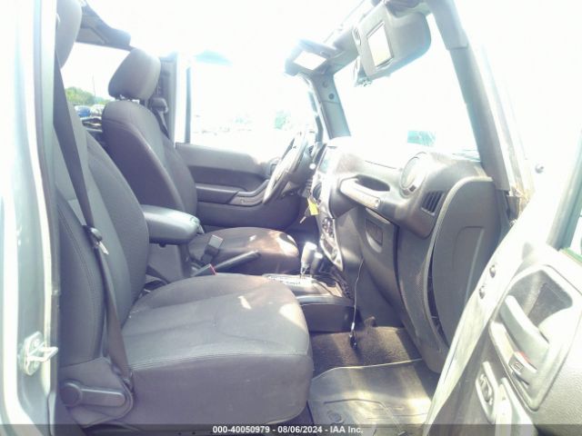 1C4BJWDG8GL158448 Jeep Wrangler Unlimited Sport