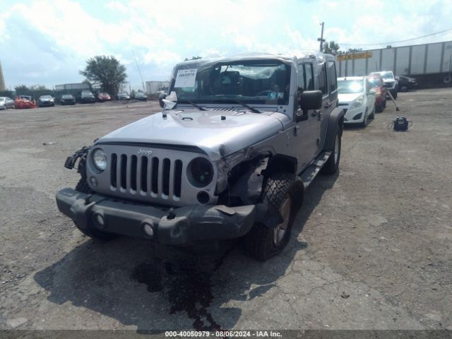 1C4BJWDG8GL158448 Jeep Wrangler Unlimited Sport