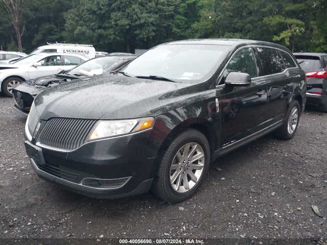 2LMHJ5NK0EBL54775 Lincoln Mkt Livery