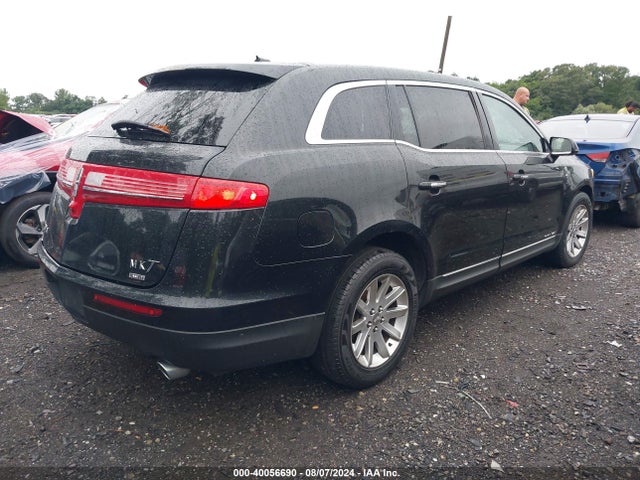 2LMHJ5NK0EBL54775 Lincoln Mkt Livery