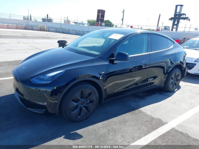 2024 TESLA MODEL Y 7SAYGDEE0RF129836 Photo 1
