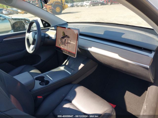 2023 TESLA MODEL Y 7SAYGDEE2PF704533 Photo 4