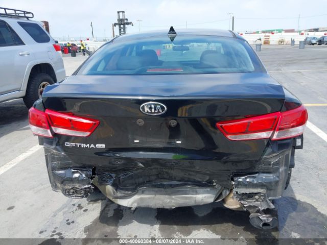 5XXGT4L32GG040995 KIA Optima Lx
