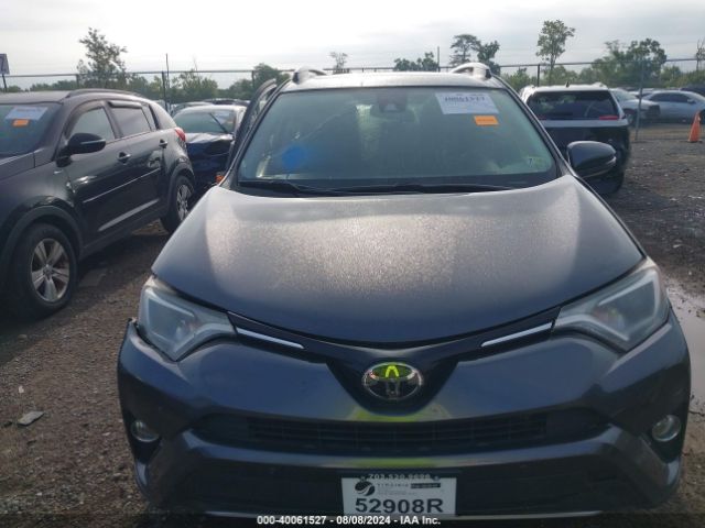 JTMRFREV7JD252238 Toyota Rav4 Xle