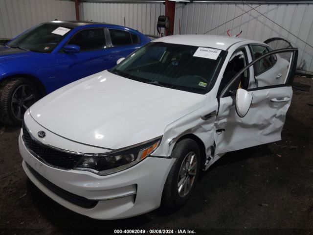 5XXGT4L34JG243555 KIA Optima Lx