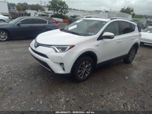 JTMRJREV7GD016955 Toyota Rav4 Hybrid Xle