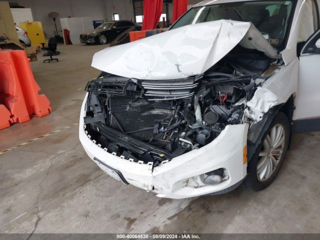 WVGBV3AX5EW547885 Volkswagen TIGUAN SE