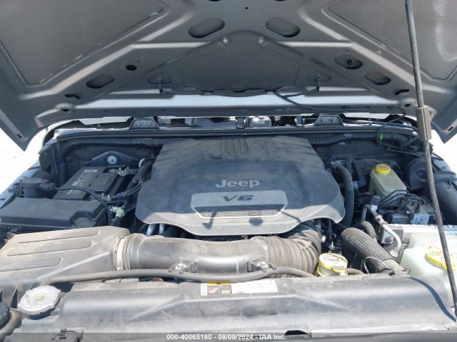1C4BJWDG8EL162836 Jeep Wrangler Unlimited Sport