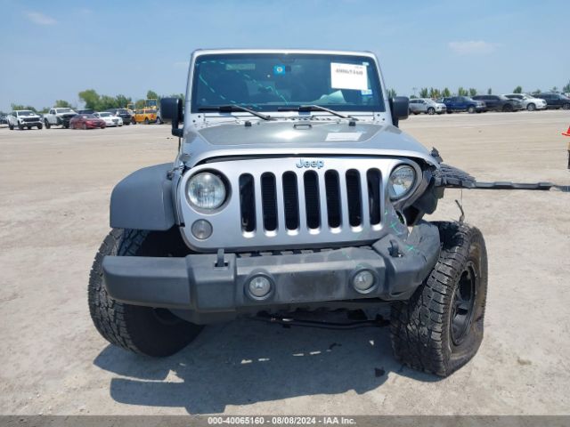 1C4BJWDG8EL162836 Jeep Wrangler Unlimited Sport