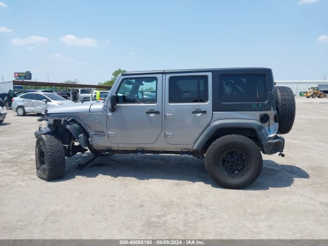 1C4BJWDG8EL162836 Jeep Wrangler Unlimited Sport
