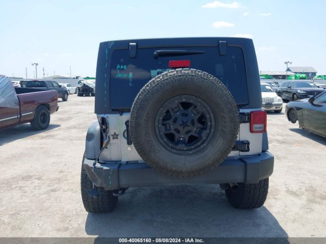 1C4BJWDG8EL162836 Jeep Wrangler Unlimited Sport