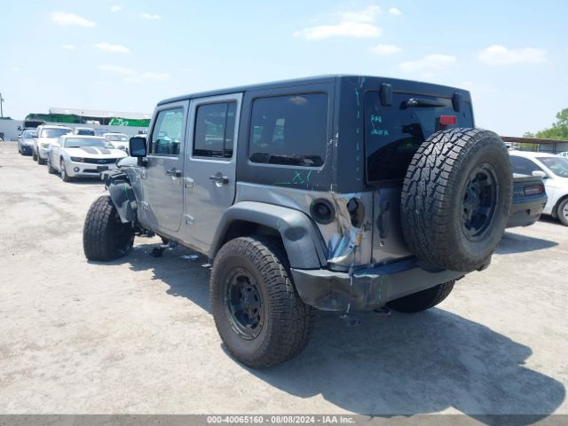 1C4BJWDG8EL162836 Jeep Wrangler Unlimited Sport