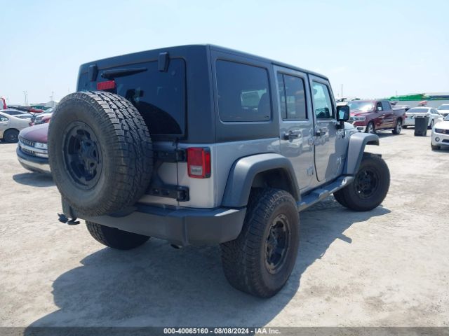 1C4BJWDG8EL162836 Jeep Wrangler Unlimited Sport