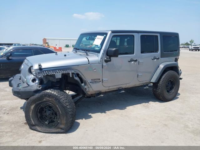 1C4BJWDG8EL162836 Jeep Wrangler Unlimited Sport