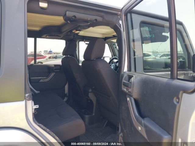 1C4BJWDG8EL162836 Jeep Wrangler Unlimited Sport