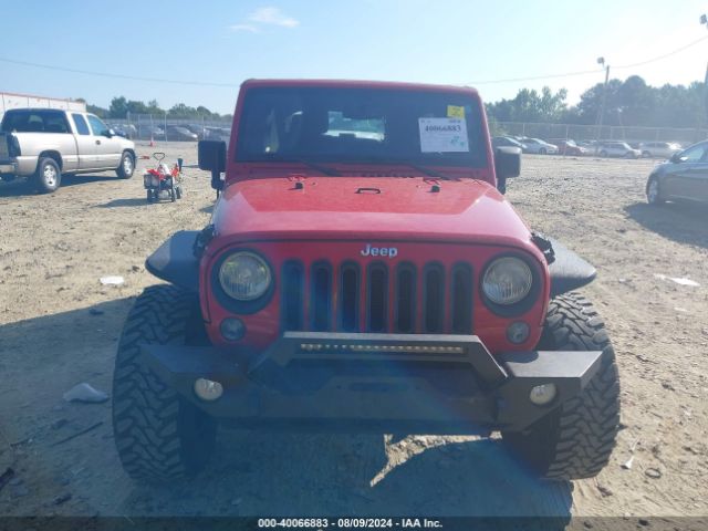 1C4BJWDG1EL132710 Jeep Wrangler Unlimited Sport