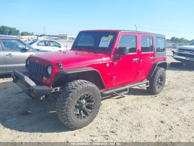 1C4BJWDG1EL132710 Jeep Wrangler Unlimited Sport