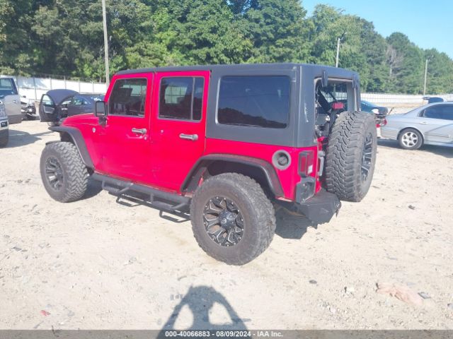 1C4BJWDG1EL132710 Jeep Wrangler Unlimited Sport