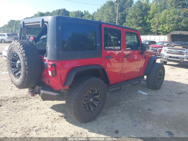 1C4BJWDG1EL132710 Jeep Wrangler Unlimited Sport