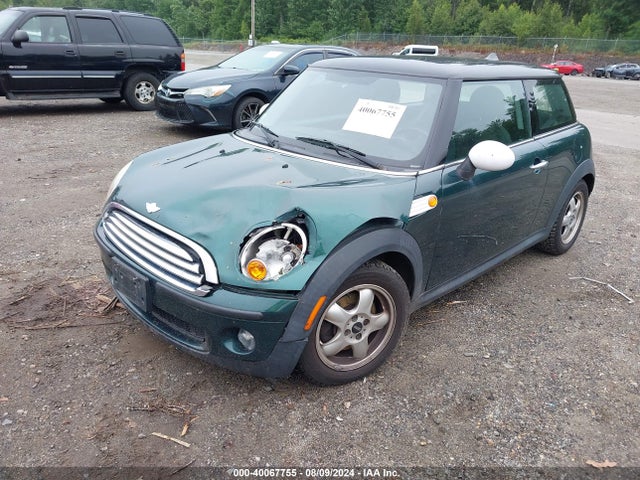 2009 MINI COOPER WMWMF33519TU73553 Photo 1