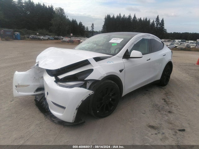 2023 TESLA MODEL Y 7SAYGDEE9PF627465 Photo 1