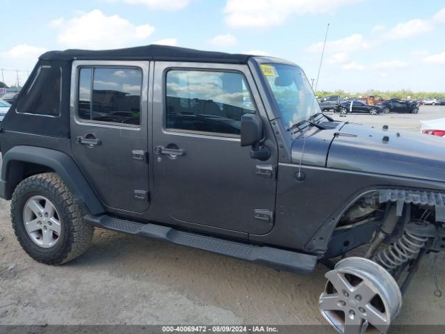 1C4BJWDG0EL223533 Jeep Wrangler Unlimited Sport