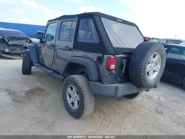 1C4BJWDG0EL223533 Jeep Wrangler Unlimited Sport