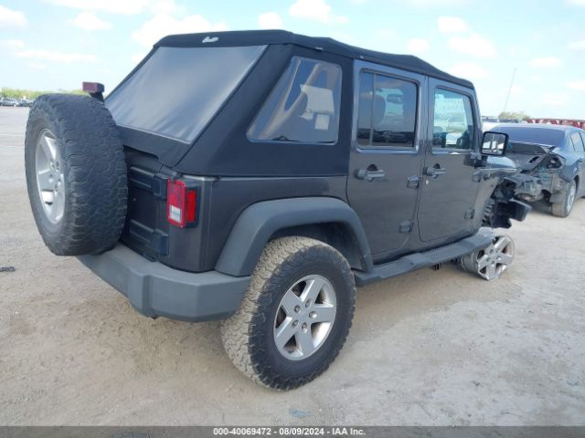 1C4BJWDG0EL223533 Jeep Wrangler Unlimited Sport