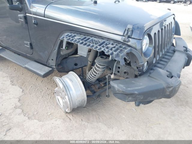 1C4BJWDG0EL223533 Jeep Wrangler Unlimited Sport