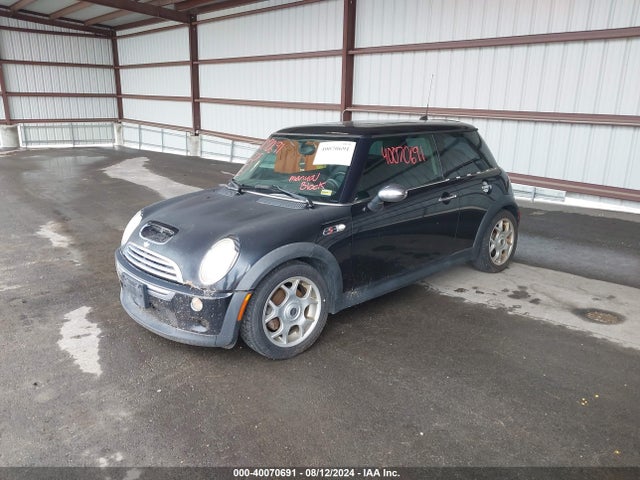 2006 MINI COOPER S WMWRE33586TN28911 Photo 1