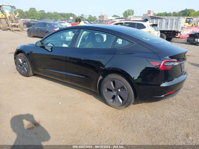 2023 TESLA MODEL 3 5YJ3E1EA3PF476115 Photo 2
