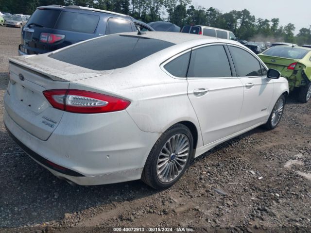 3FA6P0RU0ER329063 Ford Fusion Hybrid Titanium