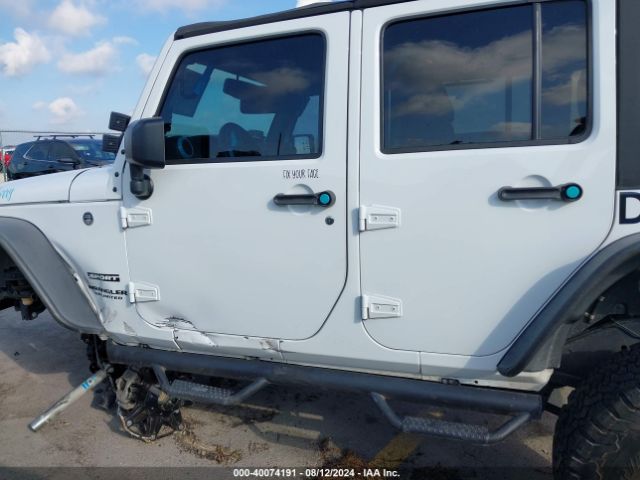 1C4BJWDG5GL107389 Jeep Wrangler Unlimited Sport