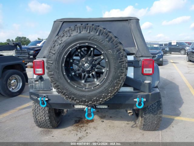 1C4BJWDG5GL107389 Jeep Wrangler Unlimited Sport