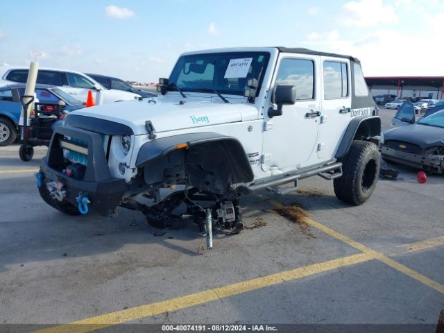 1C4BJWDG5GL107389 Jeep Wrangler Unlimited Sport