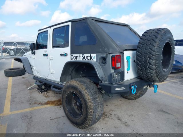 1C4BJWDG5GL107389 Jeep Wrangler Unlimited Sport
